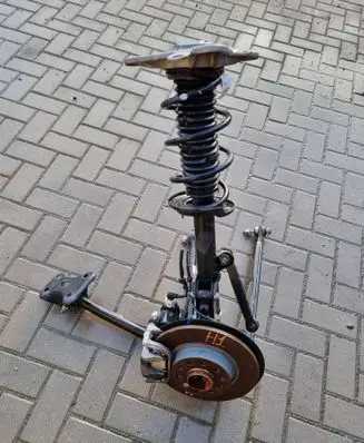 Rear wheel hub spindle/knuckle