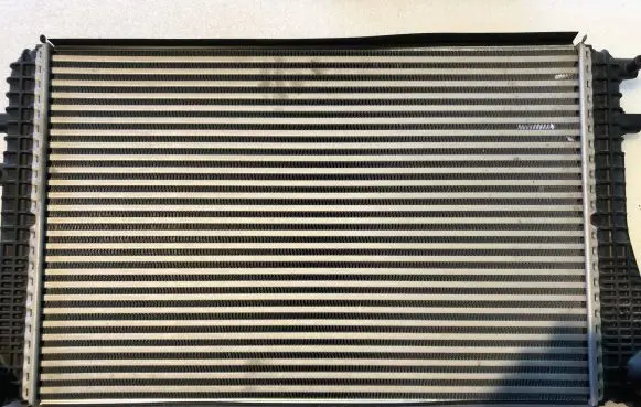 Volkswagen Golf VII Intercooler radiator 1K0145803