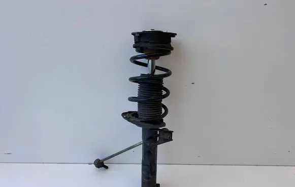 Volkswagen Golf VII Front shock absorber with coil spring 5Q0412037JL