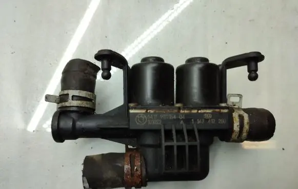 Coolant heater control valve