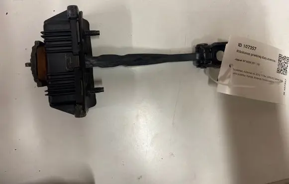 Front door check strap stopper