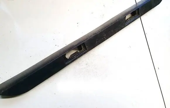 Trunk door license plate light bar