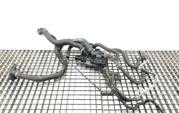 Volkswagen Golf VII Engine coolant pipe/hose 04E121042A