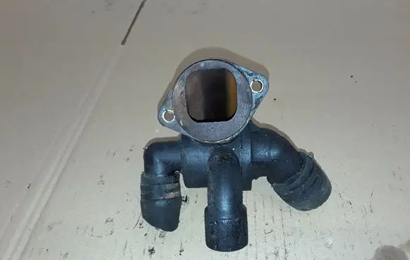 Thermostat/thermostat housing