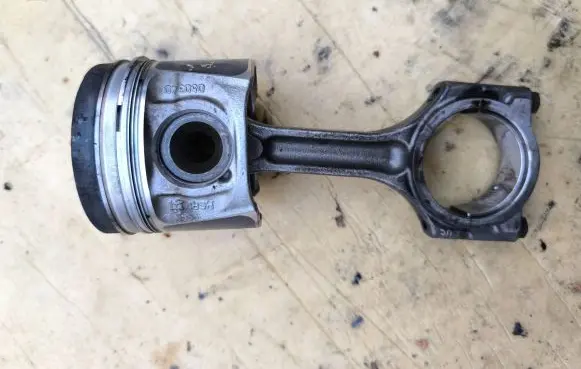 Piston with connecting rod