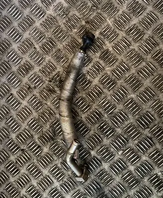 Volkswagen Golf VII Engine coolant pipe/hose 06K121497AQ