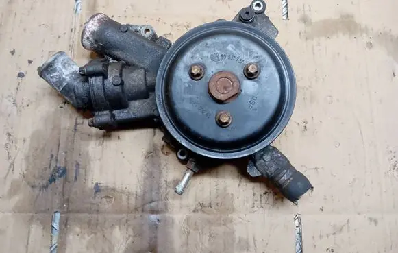 Opel Corsa D Water pump 