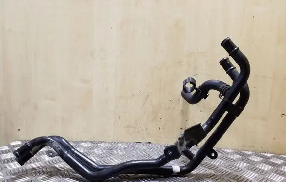 Volkswagen Touareg II Engine coolant pipe/hose 7P6121070AF