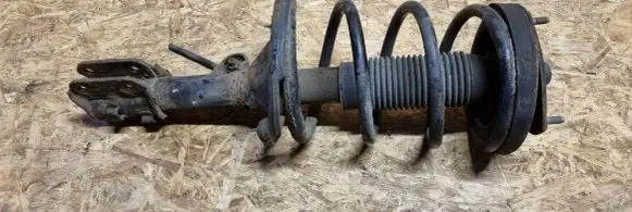 KIA Carnival Front shock absorber with coil spring