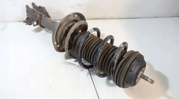 Opel Corsa D Front shock absorber with coil spring