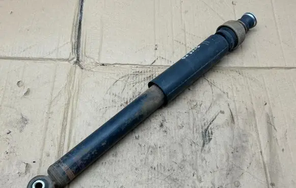Nissan Juke I F15 Rear shock absorber/damper 562101KD1A
