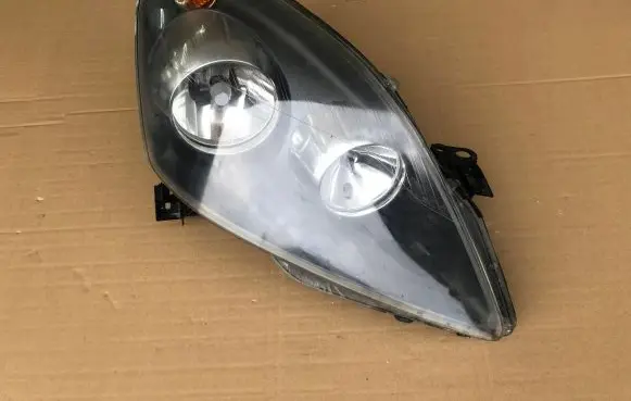 Opel Zafira B Headlight/headlamp 24451053