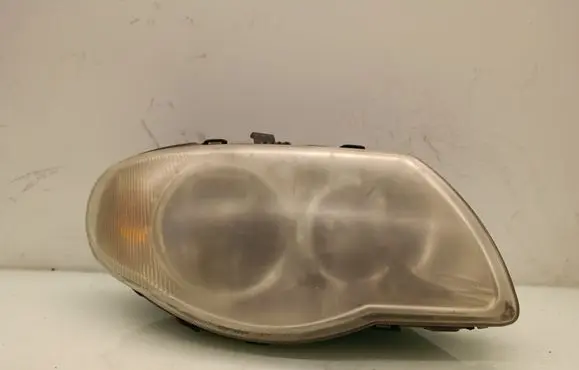 Chrysler Voyager Headlight/headlamp 04857830AC