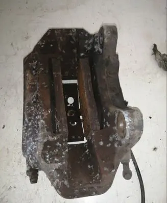 Volkswagen Touareg I Front brake caliper 209235062A