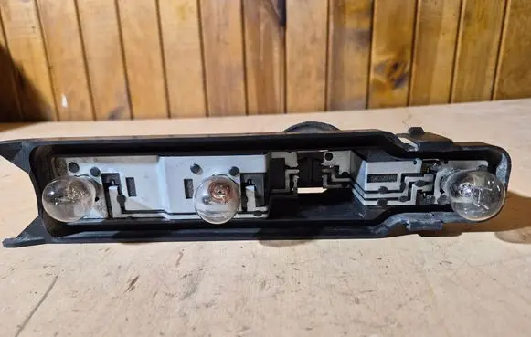 Ford Focus Tail light bulb cover holder XS4X13N004EC