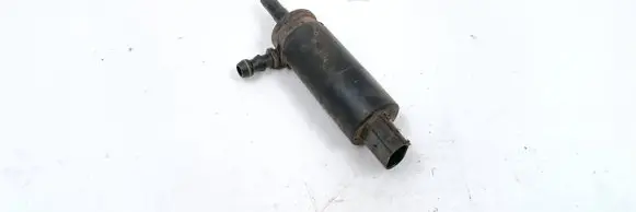 Volkswagen Golf IV Headlight washer pump 3B7955681