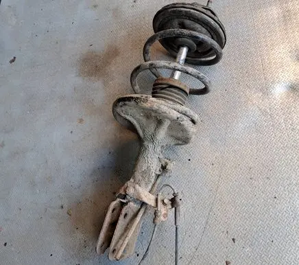 Mitsubishi Grandis Front shock absorber with coil spring