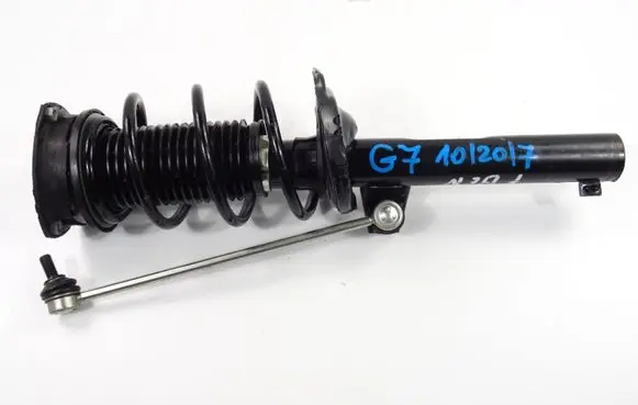 Volkswagen Golf VII Front shock absorber with coil spring