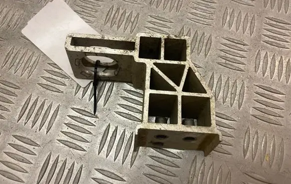 Radiator support slam panel bracket