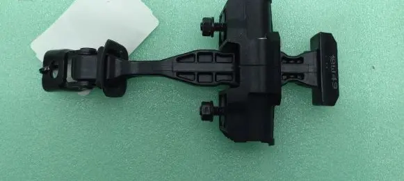 Front door check strap stopper