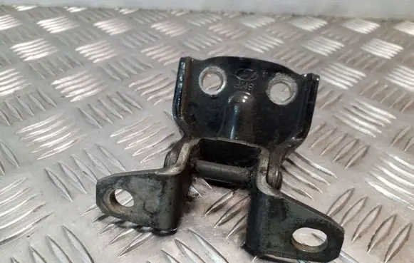 Rear door upper hinge