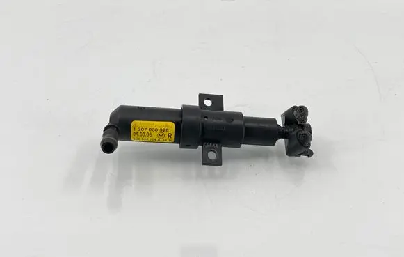 Volkswagen PASSAT B6 Headlight washer spray nozzle 1307030328 3C0955104A