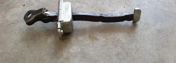 Toyota Yaris Rear door check strap stopper
