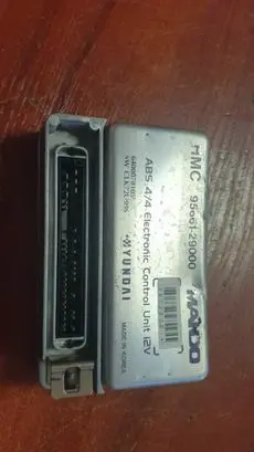Hyundai Coupe ABS control unit/module 9566129000 6400070105