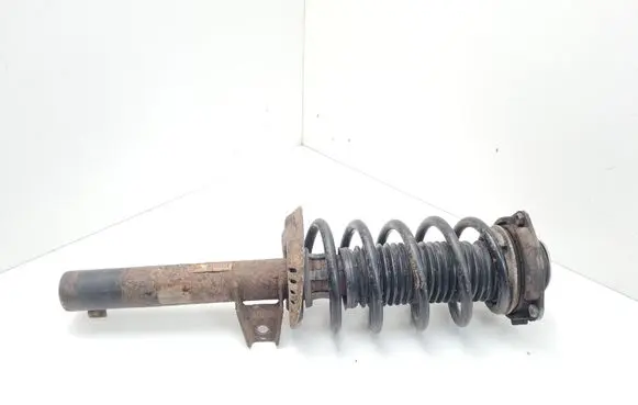 Volkswagen Caddy Front shock absorber with coil spring 1K0413031BA