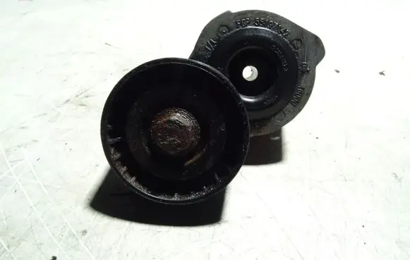 Alfa Romeo 147 Generator/alternator belt tensioner 55197142