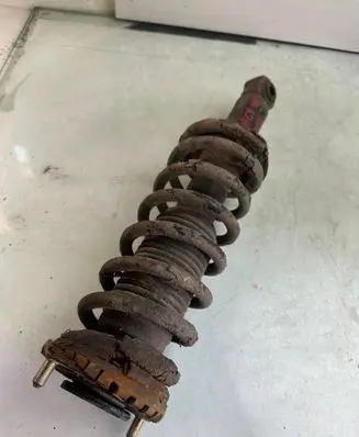 Subaru Legacy Rear shock absorber/damper 654