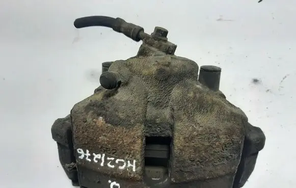 Volkswagen PASSAT B7 Front brake caliper 