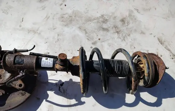 Hyundai H-1, Starex, Satellite Front shock absorber with coil spring 