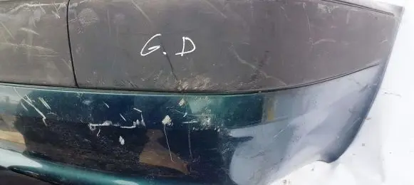 Rear bumper trim bar molding