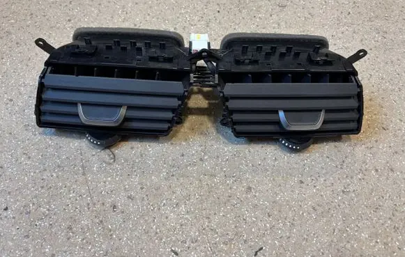 Dash center air vent grill