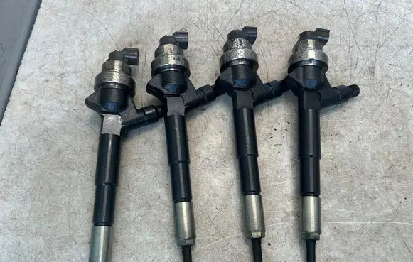 Opel Astra J Fuel injectors set 8973762702