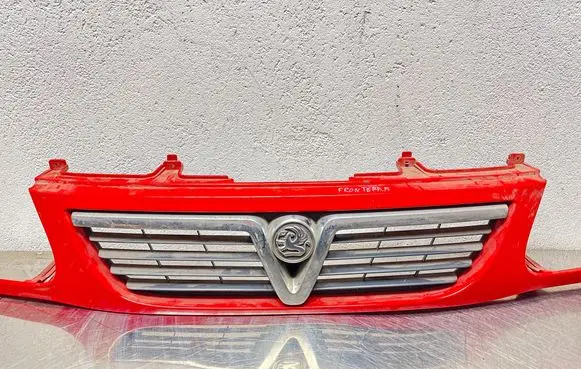 Opel Frontera B Front bumper upper radiator grill 91161390 464192822