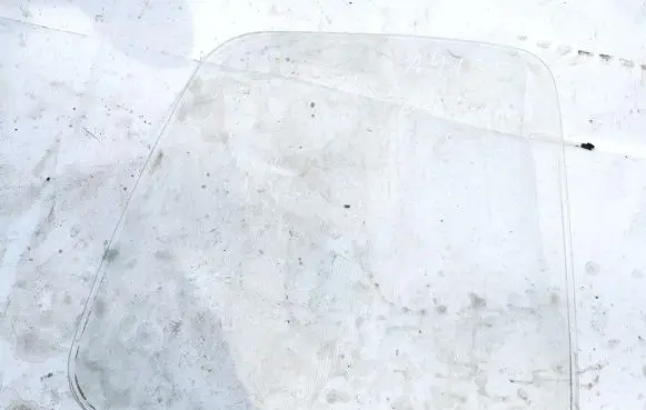 Ford Escort Front door window glass four-door