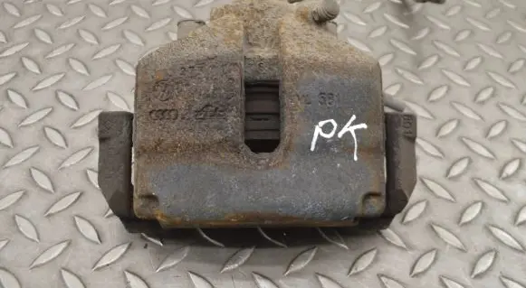 Volkswagen Golf VII Front brake caliper