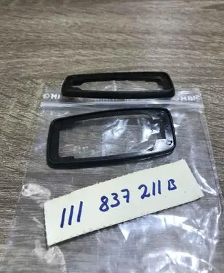 Volkswagen Beetle 1302 Front door exterior handle/bracket 111837211B