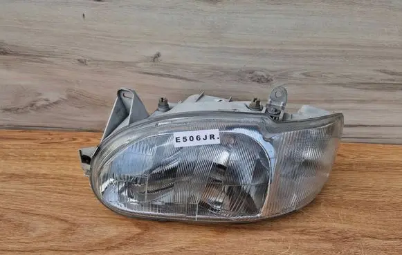 Ford Escort Headlight/headlamp 20-5036B