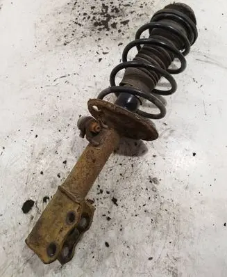 Toyota Yaris Front shock absorber with coil spring
