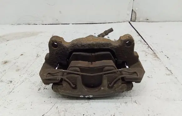 Volkswagen Golf V Front brake caliper