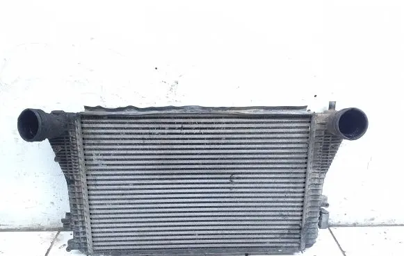 Volkswagen Touran I Intercooler radiator 1K0145803A