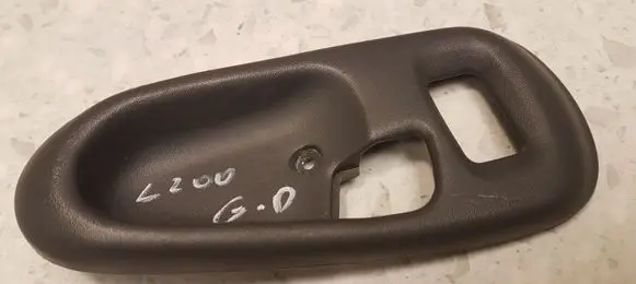 Mitsubishi L200 Rear door handle trim MR144546