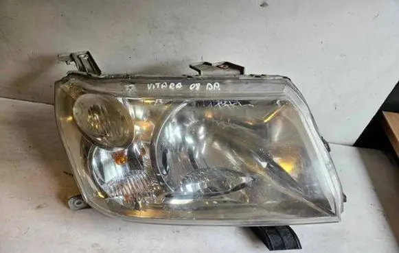 Suzuki Grand Vitara II Headlight/headlamp 10059076