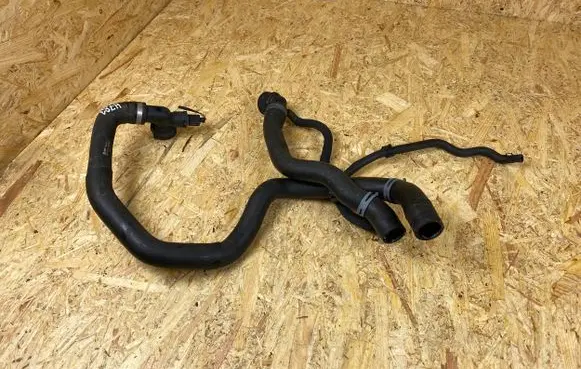 Volkswagen Golf VII Engine coolant pipe/hose 5Q0121049AC