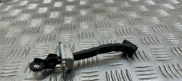 Mazda 3 II Rear door check strap stopper