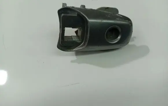 Mazda 3 I Front door lock (next to the handle) 