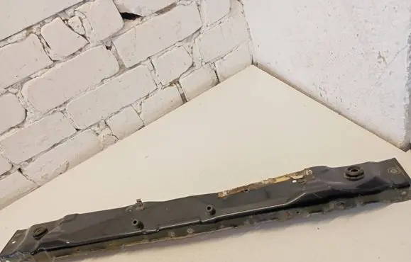 Radiator support slam panel bracket